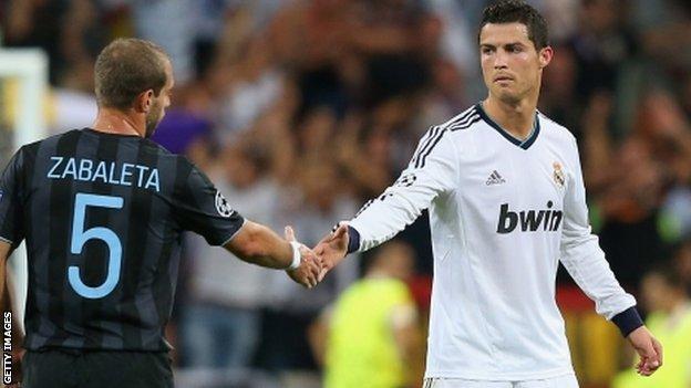 Cristiano Ronaldo and Pablo Zabaleta shake hands at the final whistle
