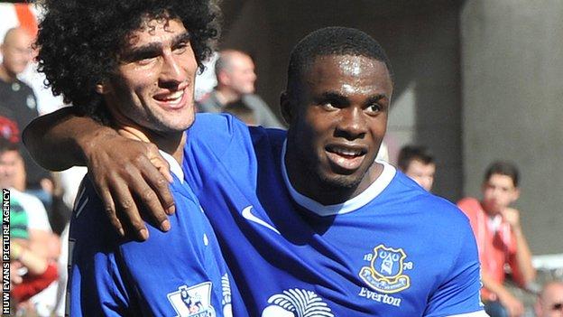 Everton scorers Marouane Fellaini and Victor Anichebe celebrate at the Liberty Stadium