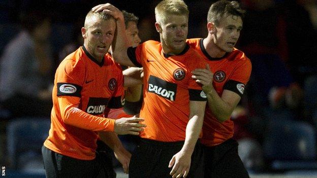 Dundee United celebrate after Johnny Russell (left) opens the scoring