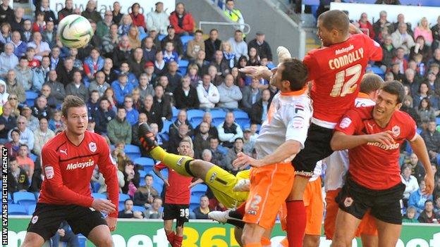 Matthew Connolly scores Cardiff's third goal against Blackpool