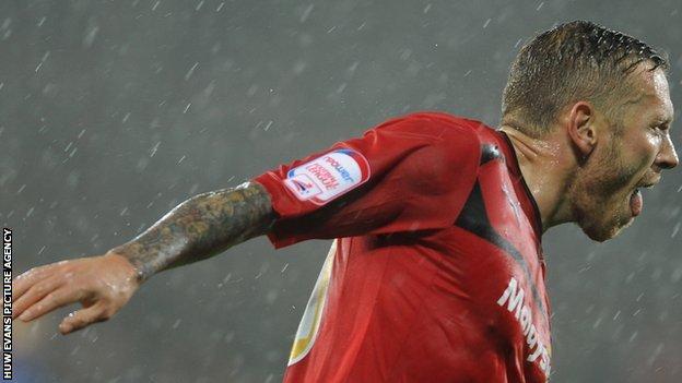 Craig Bellamy celebrates his opener