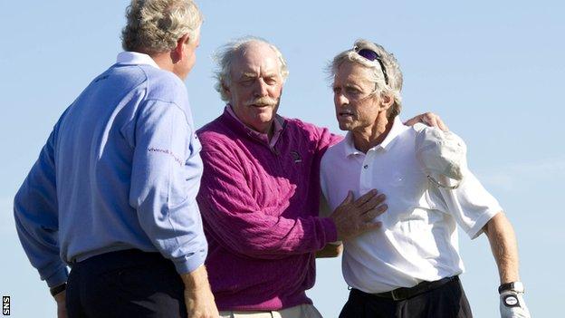 Dermot Desmond (centre) at the Alfred Dunhill Links Championship with Colin Montgomerie and Michael Douglas