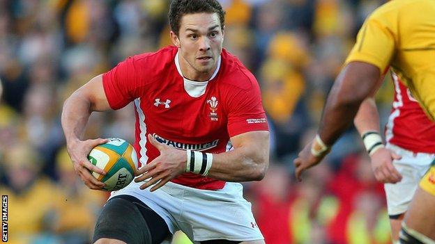 Wales wing George North takes on the Australia defence