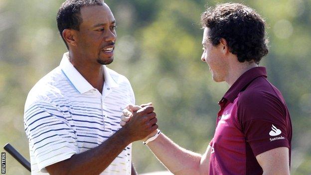 Tiger Woods (left) with Rory McIlroy