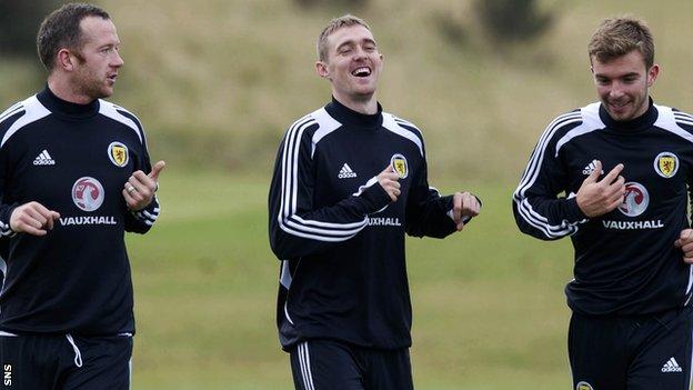 Scotland captain Darren Fletcher (centre) shares a joke with Charlie Adam and James Morrison