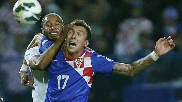 Wales' Ashley Williams challenges Croatia goal-scorer Mario Mandzukic