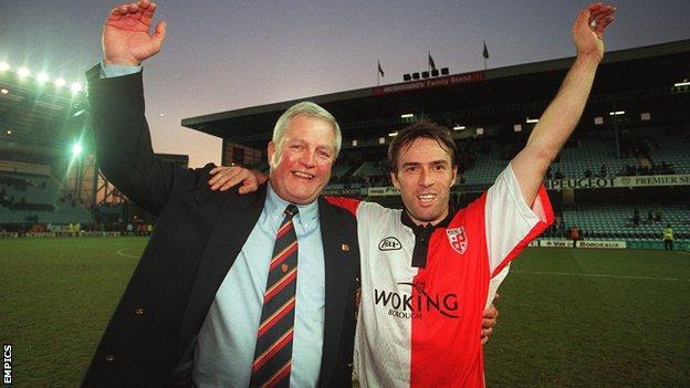 Woking boss Geoff Chapple and midfielder Steve Thompson celebrate after drawing at Coventry City in the third round of the FA Cup in 1997
