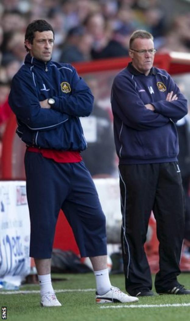 Ross (left) on the sidelines with Adamson as the Sons head for play-off victory