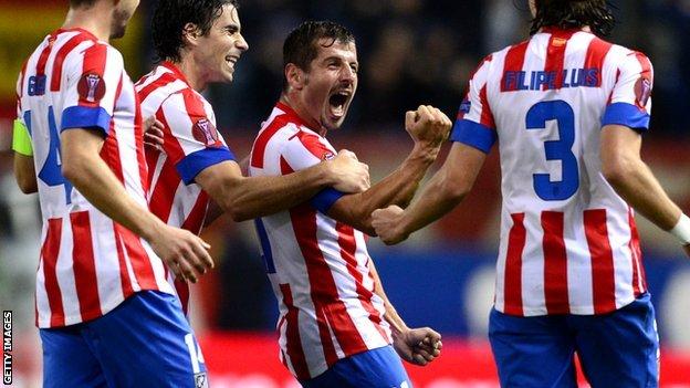 Emre celebrates his Atletico Madrid goal