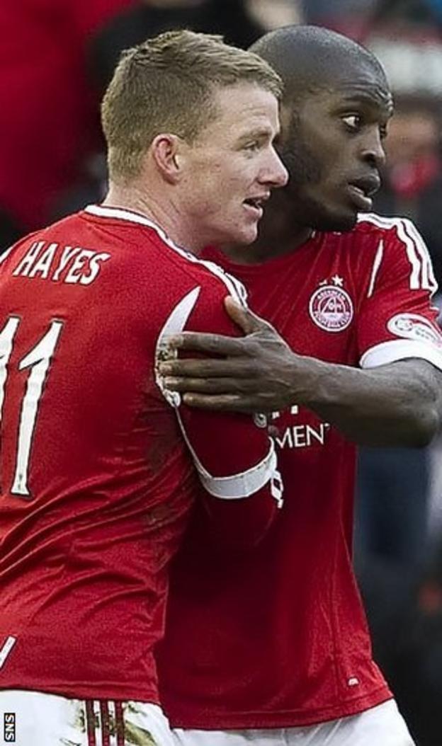 Hayes is congratulated by Isaac Osbourne after scoring at Pittodrie