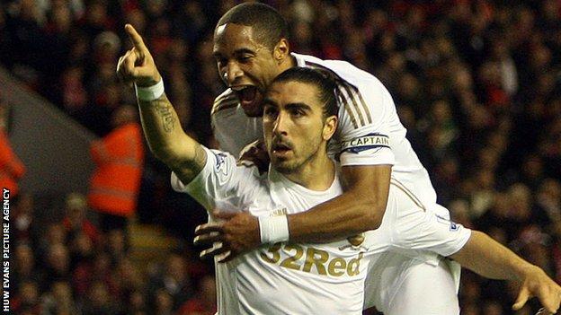 Ashley Williams celebrates with Chico Flores