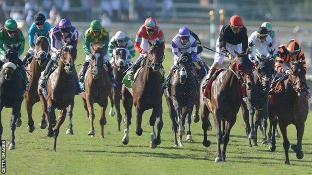 Little Mike (left) wins the Breeders' Cup Turf in California