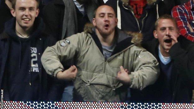 Fan in alleged racist gesture