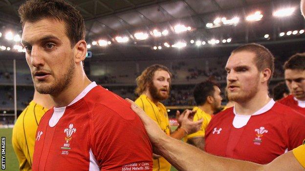 Wales captain Sam Warburton (left) leaves the field after an agonising 20-19 loss to Australia in June