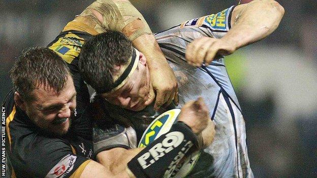 Robin Copeland is tackled by Wasps' Tinus Du Plessis