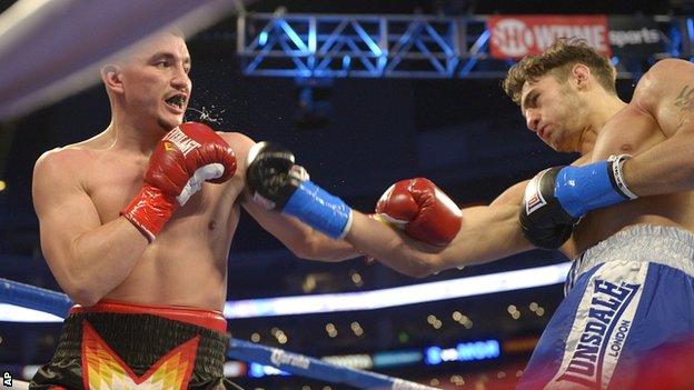 Nathan Cleverly (right) lands another blow against Shawn Hawk