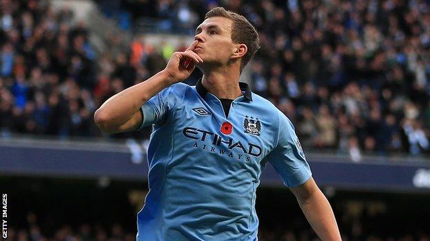 EDIN DZEKO CELEBRATES MANCHESTER CITY V STOKE CITY F ETIHAD