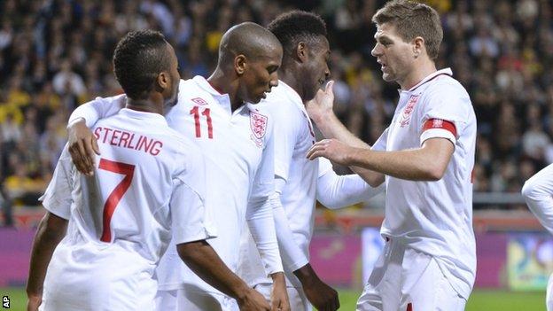 Raheem Sterling, Ashley Young and Steven Gerrard celebrate Danny Welbeck's goal