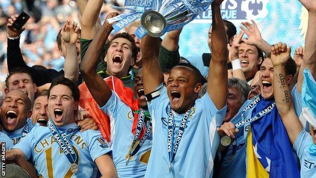 Manchester City with the 2011/12 Premier League trophy