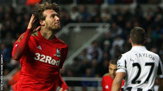 Michu celebrates after scoring Swansea's opening goal