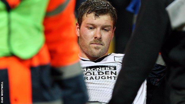 Preston's Scott Laird is carried off with a broken leg against Notts County