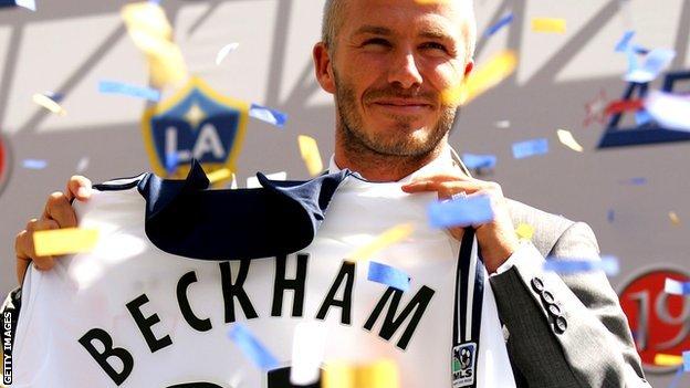 David Beckham poses with LA Galaxy shirt