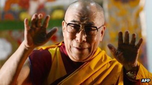 The Dalai Lama gestures prior to start a public teaching in Yokohama, Japan, 04 Nov 2012