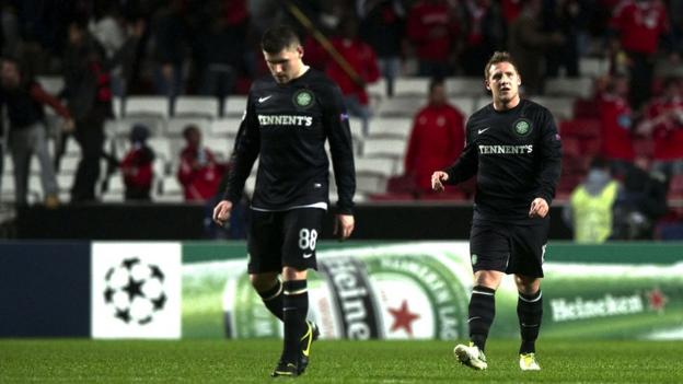 Celtic's Gary Hooper (left) and Kris Commons walk off the Benfica pitch