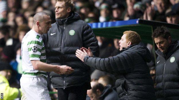 Brown is congratulated for his performance by manager Neil Lennon