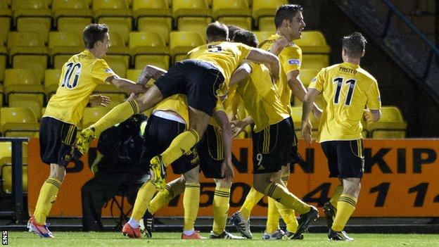 Jesus Garcia Tena (2nd from right) is congratulated by his team mates after scoring to give Livingston the lead