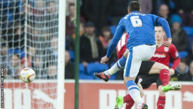 Michael Bostwick scores Peterborough's opening goal