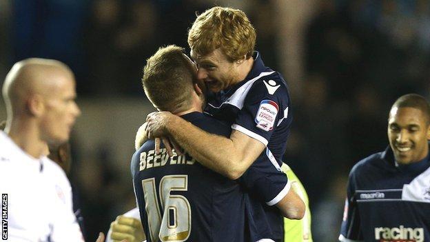 Chris Taylor of Millwall celebrates the win with team mate Mark Beevers