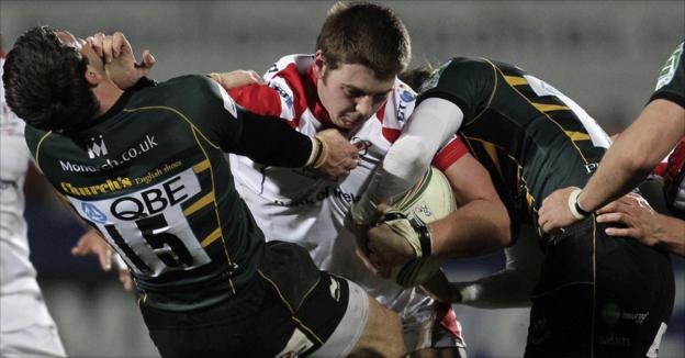 Ulster's Iain Henderson shrugs off Northampton's Ben Foden and Lee Dickson