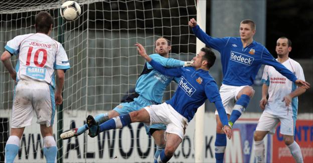 Goalmouth action from Glenavon's win over Ballymena United at Mourneview Park