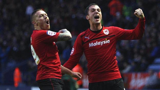Craig Bellamy and Cardiff team-mate Andrew Taylor celebrate during the 1-0 win at Leicester