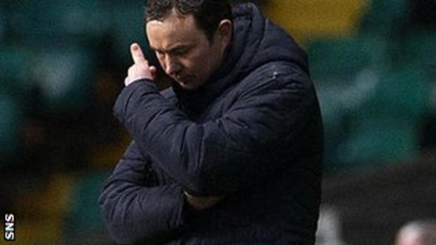 Adams looks disconsolate as his side slip to defeat at Celtic Park