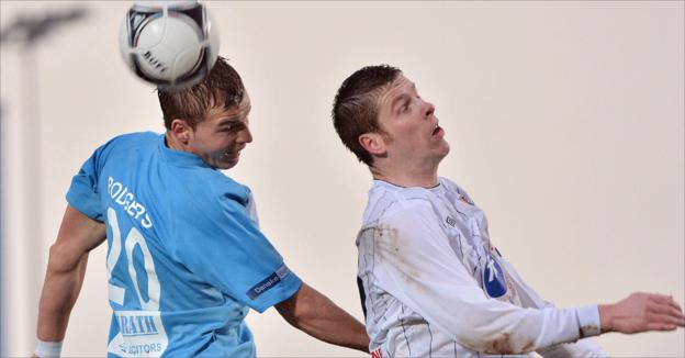Chris Rodgers and Darren Boyce jump for a high ball as Coleraine beat Ballymena