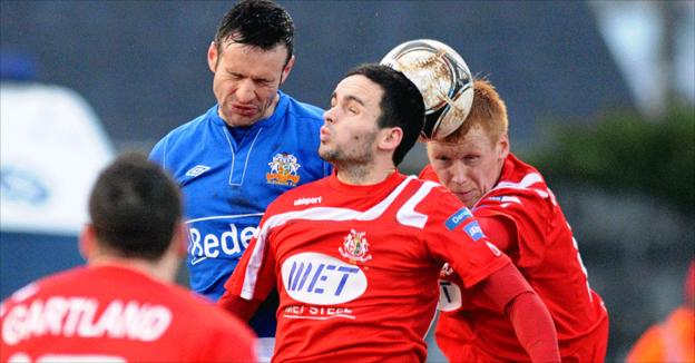 Ciaran Martyn and Neil McCafferty in action during Portadown's win over Glenavon