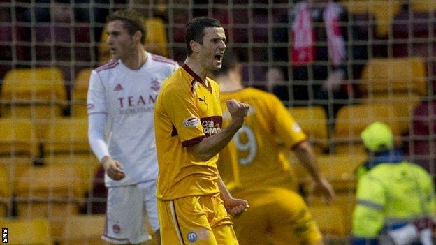 Jamie Murphy celebrates one of his two goals in Motherwell's win over Aberdeen