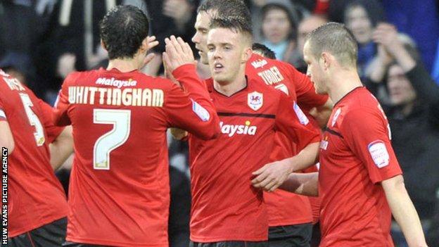 Craig Noone celebrates with teammates after equalising for Cardiff City against Crystal Palace.