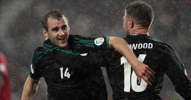 Niall McGinn celebrates after scoring Northern Ireland's goal in the 1-1 draw with Portugal