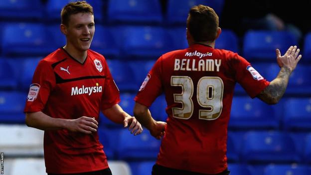 Craig Bellamy congratulates Joe Mason, who scores Cardiff's opener in the Championship at Birmingham
