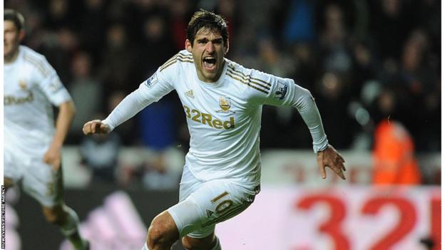 Danny Graham celebrates scoring a stoppage time equaliser for Swansea City in the 2-all draw against Aston Villa