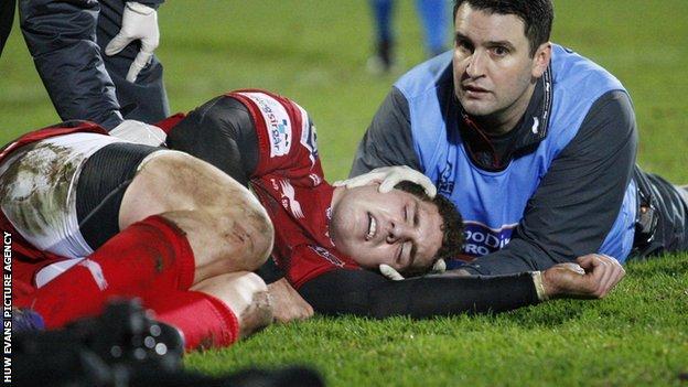 George North receives treatment at Ravenhill
