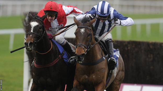 Monbeg Dude (left) beats Teaforthree in the bad-weather delayed 2012 Welsh National at Chepstow