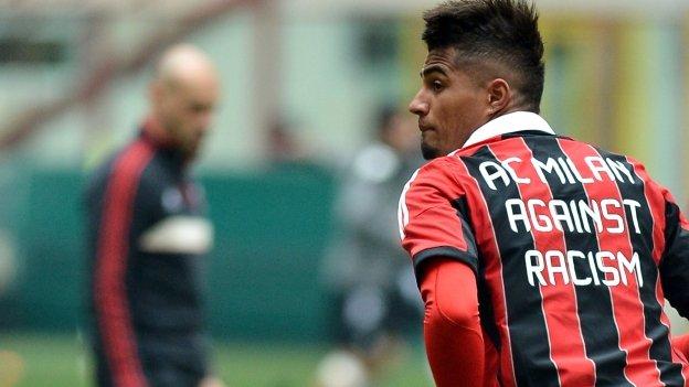 AC Milan's Ghana defender Kevin-Prince Boateng warms up, wearing a jersey against the racism