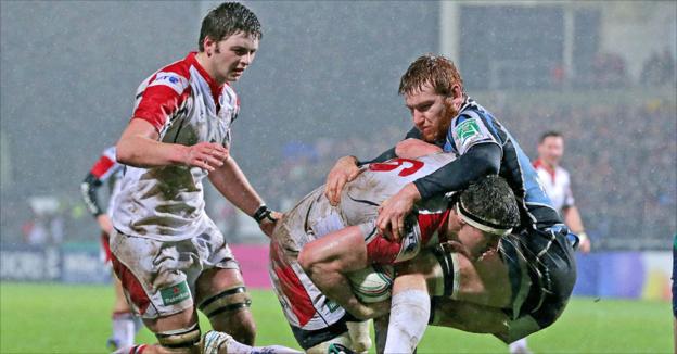 Robbie Diack makes ground for Ulster at the expense of Rob Harley as Iain Henderson looks on
