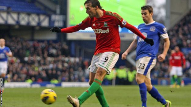 Michu comes closest to scoring for Swansea when his chip is pushed onto the bar by Everton goalkeeper Tim Howard