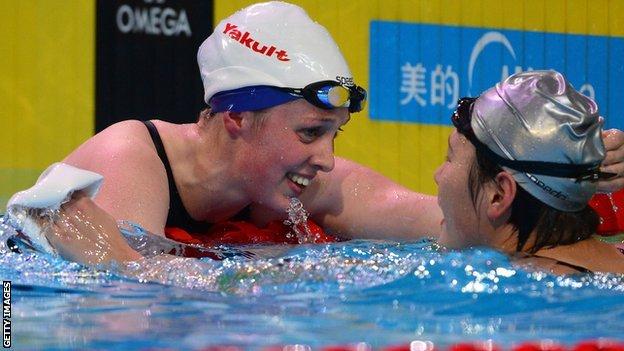 Hannah Miley congratulates Ye Shiwen of China for winning the women's 200m individual medley final in Istanbul