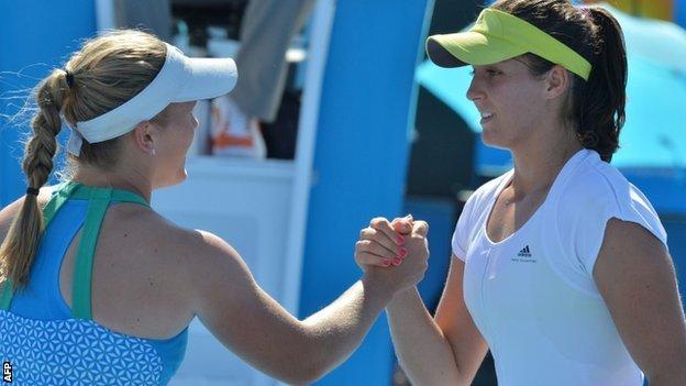 Laura Robson (right) shakes hands with Melanie Oudin after her first-round victory